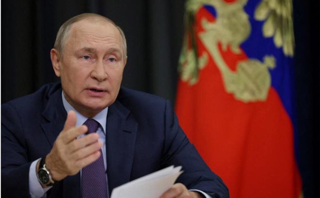 FILE PHOTO: Russian President Vladimir Putin chairs a meeting via video link in Sochi