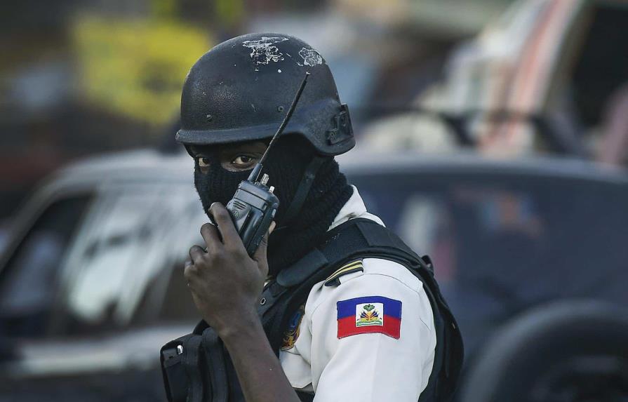 policia-haitiano-ap-foto-0dbfd55b-focus-min0.13-0.51-895-573